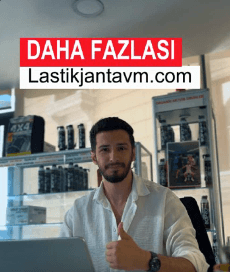 Lastikjantavm servisinde bir otomobil lastiğinin profesyonel ekipmanla janta monte edilmesi